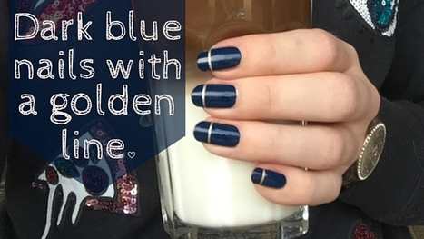 Dark blue nails with a golden line by iPoca. I saw u saw warsaw by OPI is used and Maybelline metallic gold. 